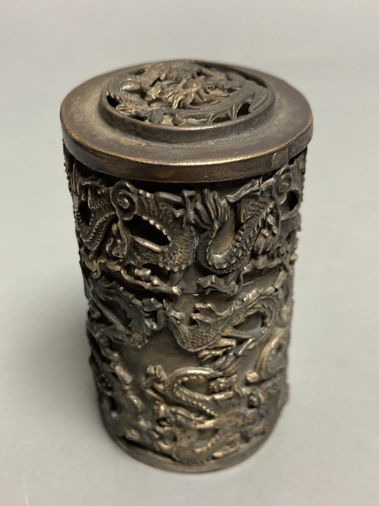 A Chinese white metal 'dragon' jar and cover, length 7cm